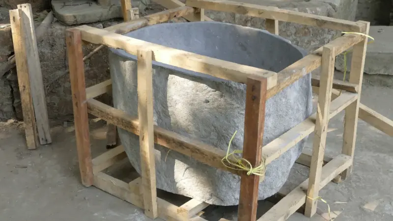 Product image 1 of the product “Basin from Riverstone, Natural surface, polished inside. Length 87 cm, Width 83 cm, Height 50 cm, Depth 40 cm. ”